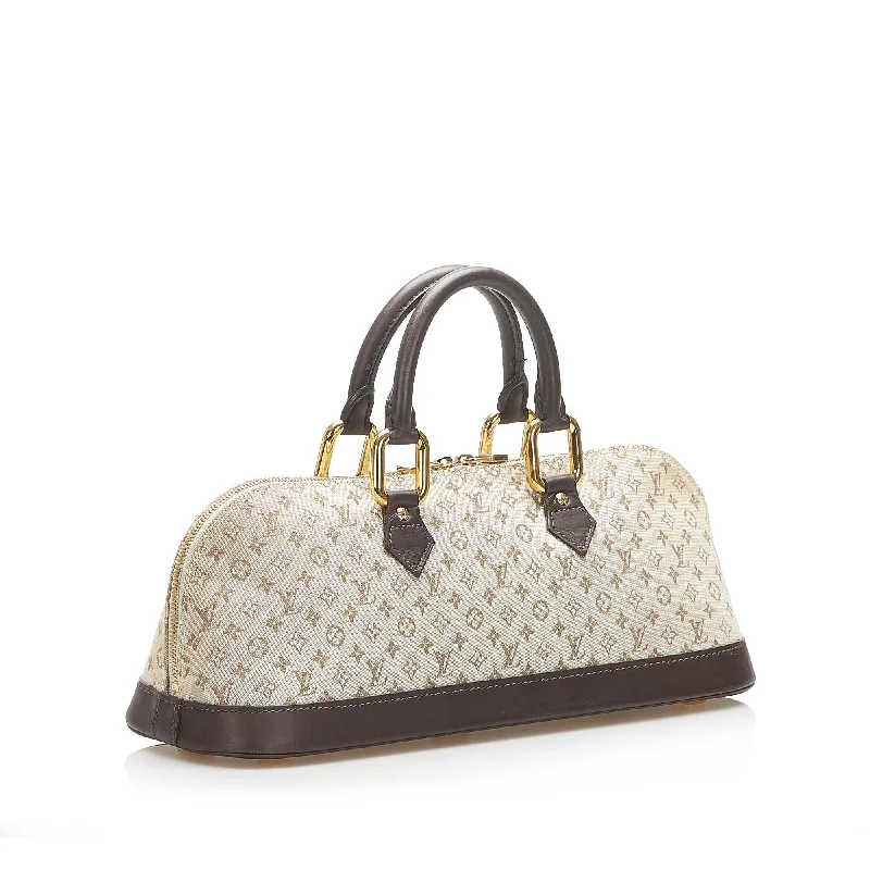 Best bags for business tripsLouis Vuitton Monogram Mini Lin Alma Long Handbag (SHG-16564)