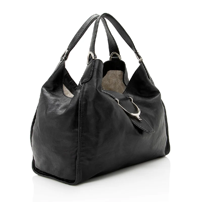 Mini bags for evening outGucci Leather Stirrup Tote (20803)